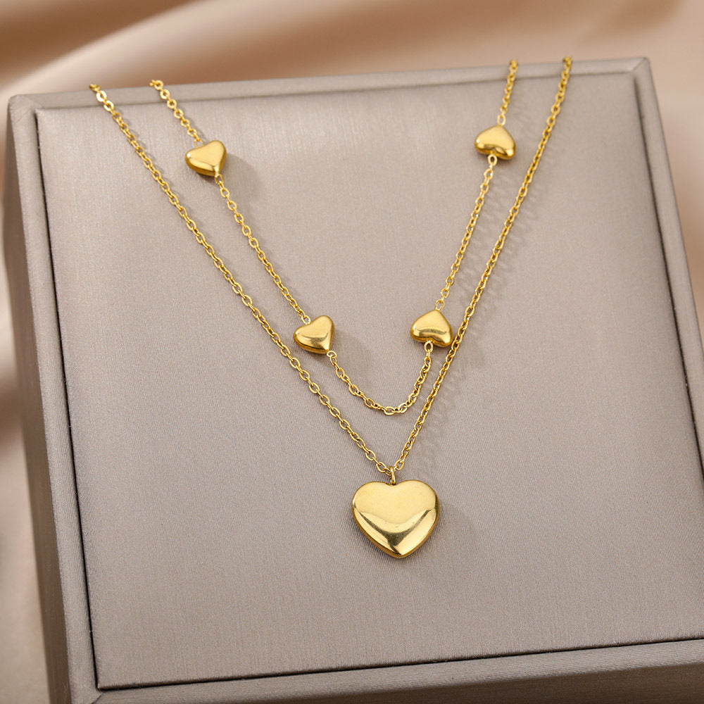 Collier multicouche pendentif cœur